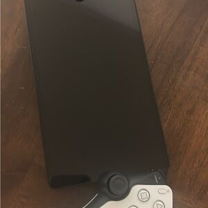 Black Smartphone with White Controller